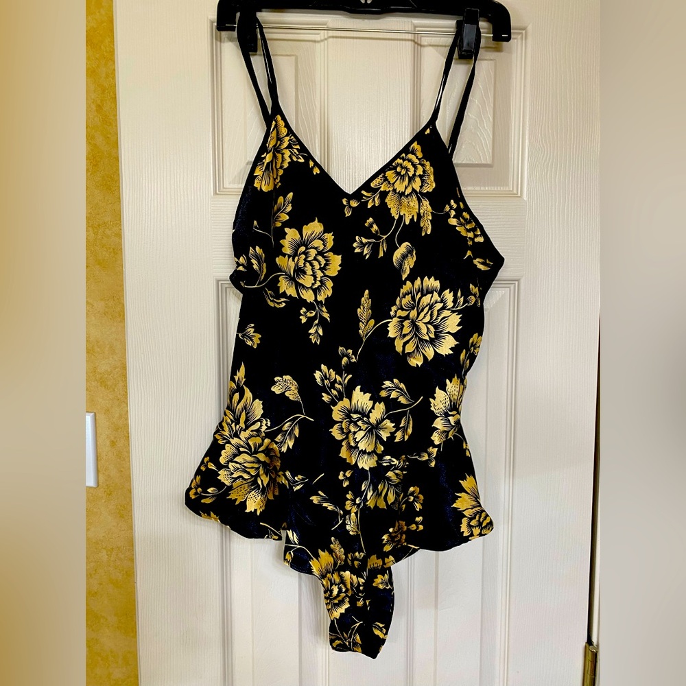 Blk  Gold Sleepwear. Worn once, a bit small, size medium.